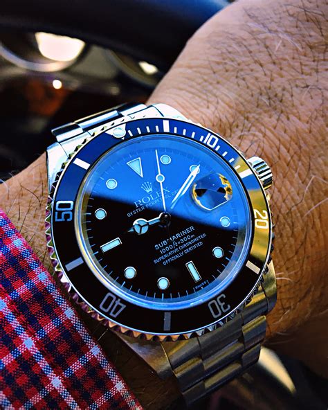 rolex submariner black tie.